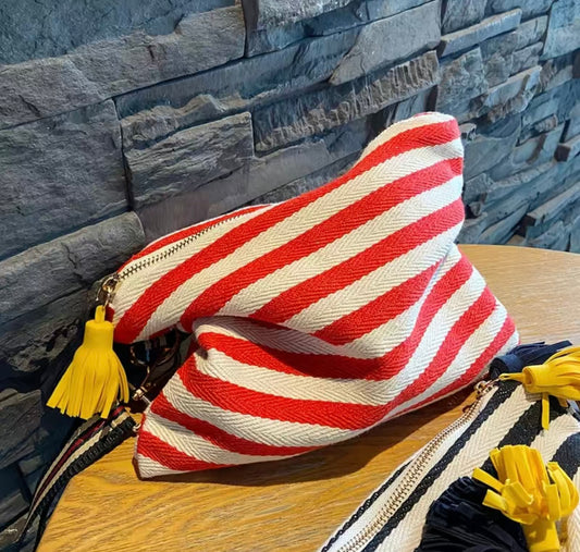 Striped tassle clutch